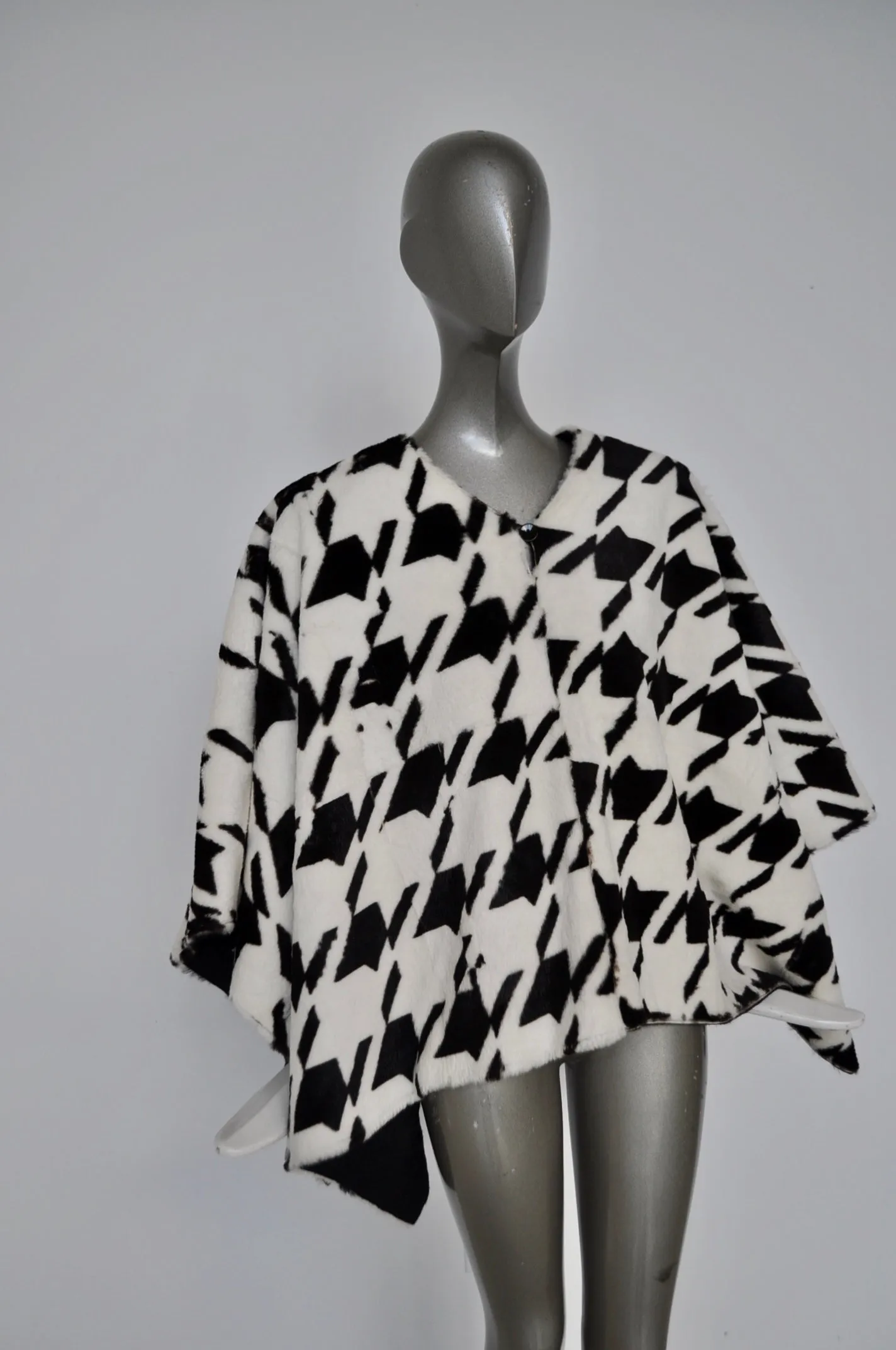 Fabulous fur cape with houndstooth print.